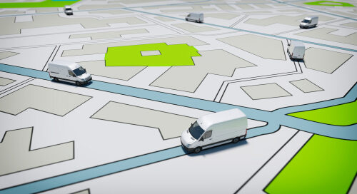 Trucks,on,a,road,city,map.,concept,of,global,shipment