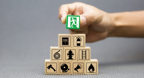 Close Up,hand,choose,a,wooden,toy,blocks,with,fire,exit